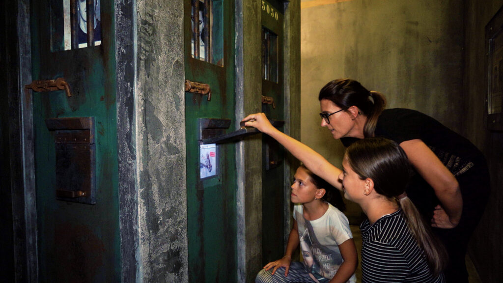 Family inside Prison Quest